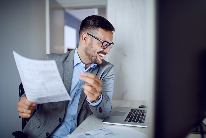 young business professional with laptop